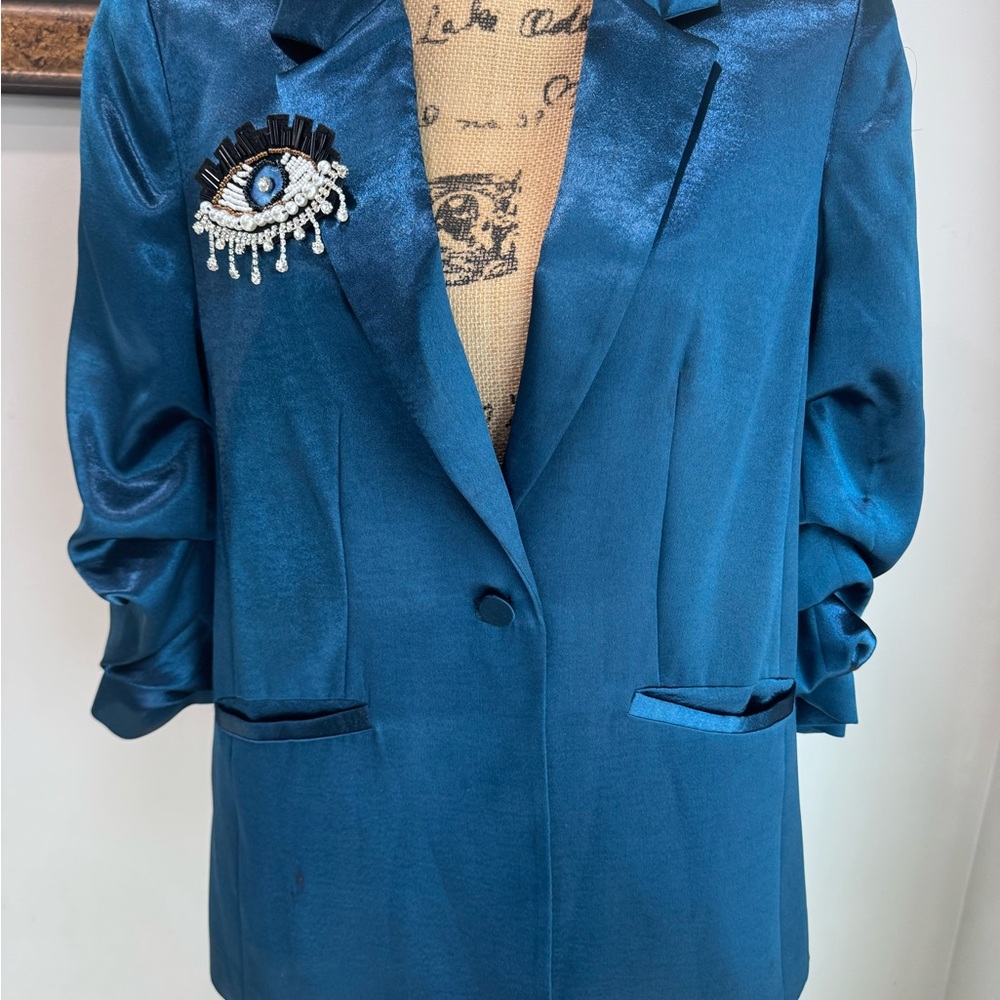 Cinq à Sept Shimmering Teal Blazer with Eye Brooch
